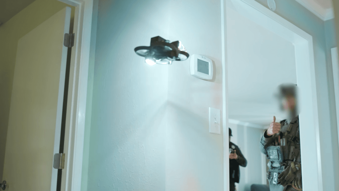 Odd police video shows drone removing knife from motionless suspect